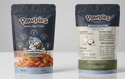 Two packages of Pawpies Crunchy Chicken dog treats on a white background

